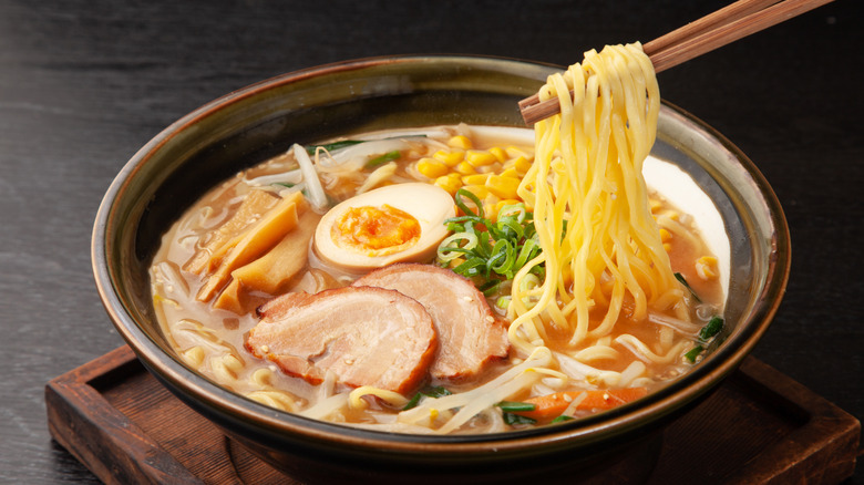 bowl of ramen with chopsticks