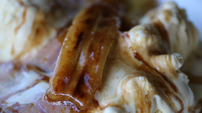 Bananas foster over melty vanilla ice cream