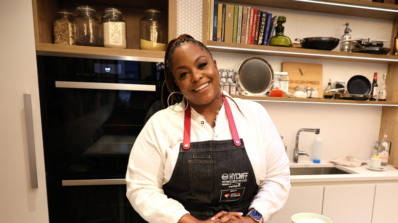 Kardea Brown smiling in kitchen