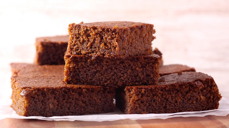 Pieces of old-fashioned gingerbread on cutting board