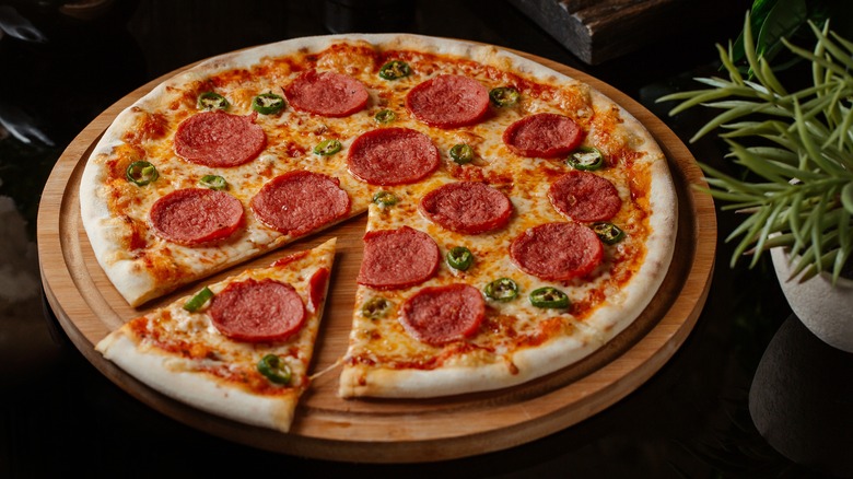 Pizza with one slice cut out