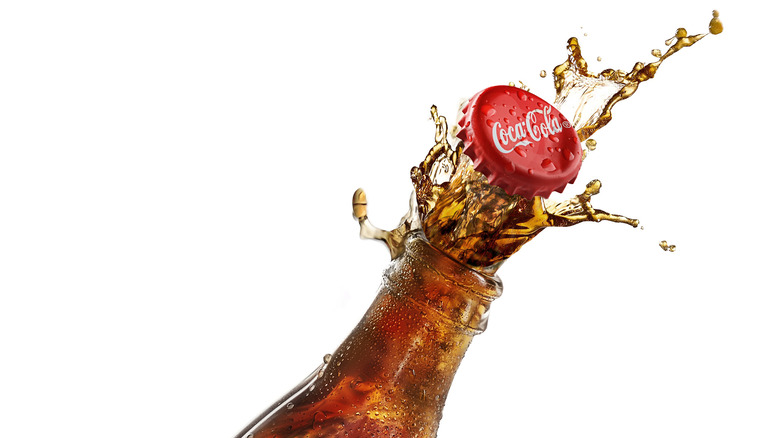 Open bottle of Coca-Cola