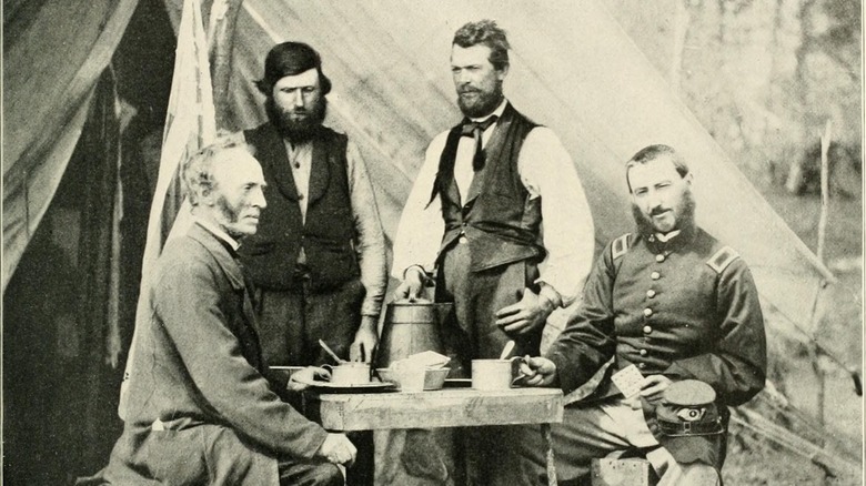 Civil War soldiers drinking coffee on table, May 1862