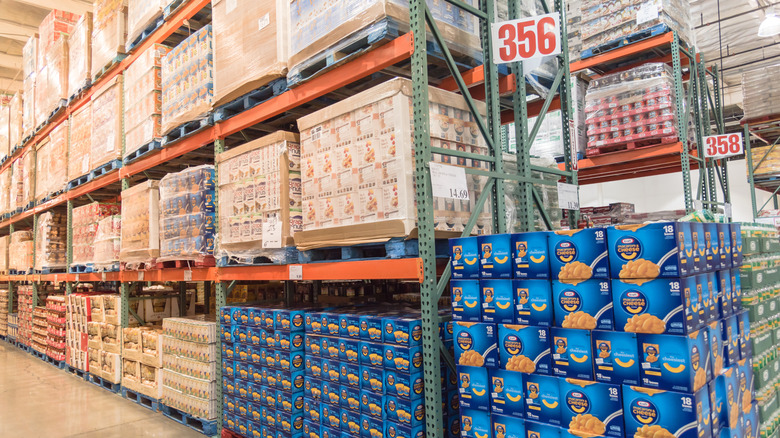 Interior of Costco store with products stacked in aisles