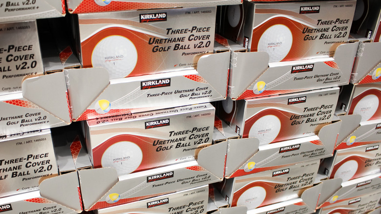 Stacked boxes of Kirkland Signature golf balls