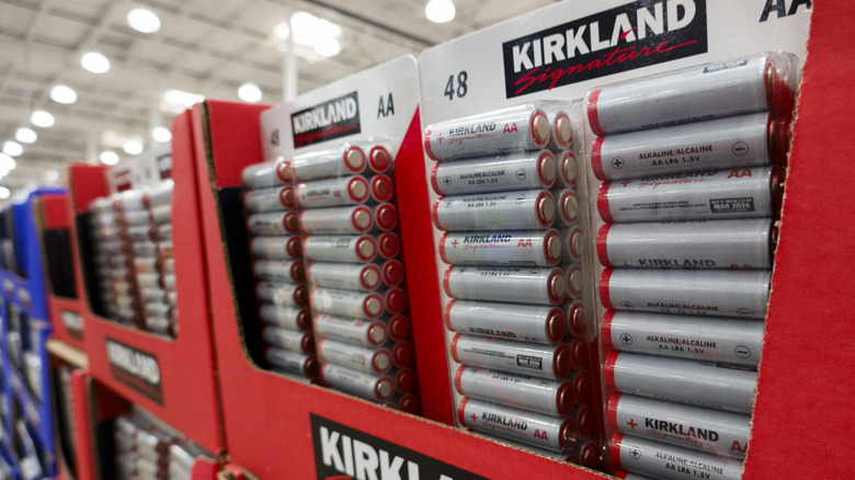 An aisle of Kirkland Signature AA batteries at Costco