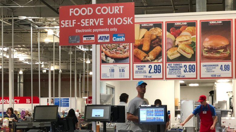 Costco food court features a cheeseburger on menu board