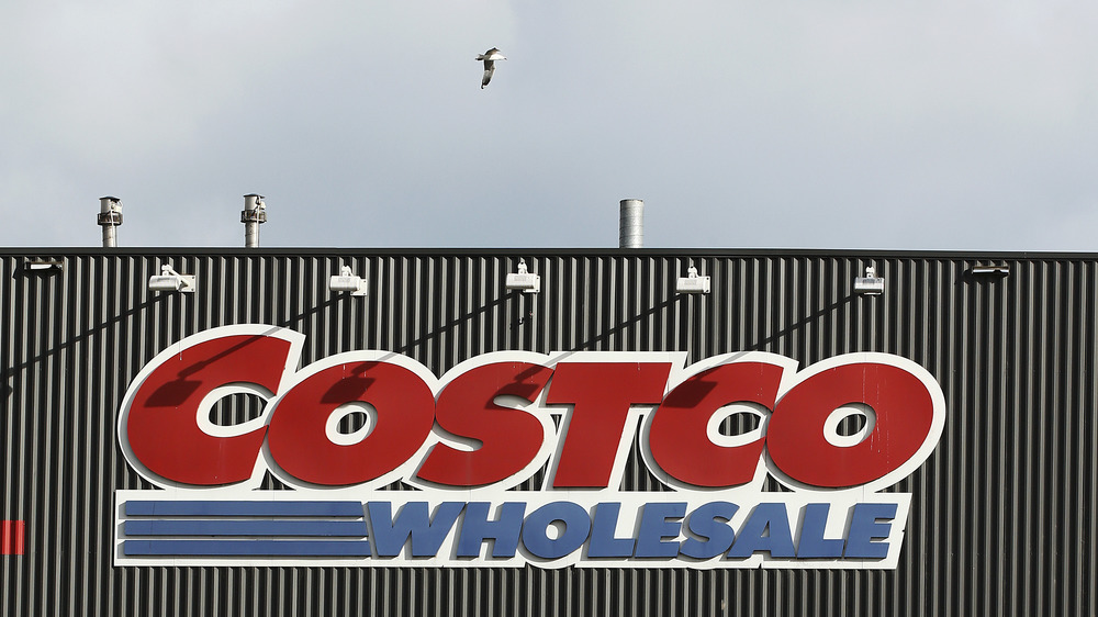 Costco sign and flying bird