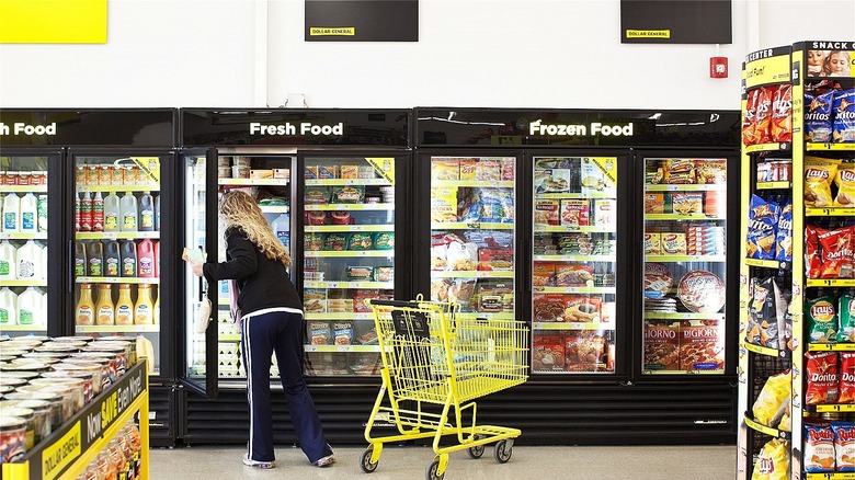 woman in Dollar General frozen section