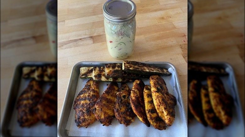 Grilled chicken, zucchini, and salad