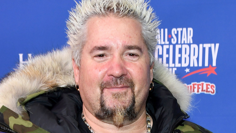 Guy Fieri smiling at event 