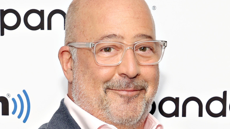 Andrew Zimmern smiling