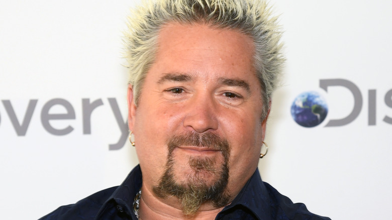 Guy Fieri wearing a black shirt