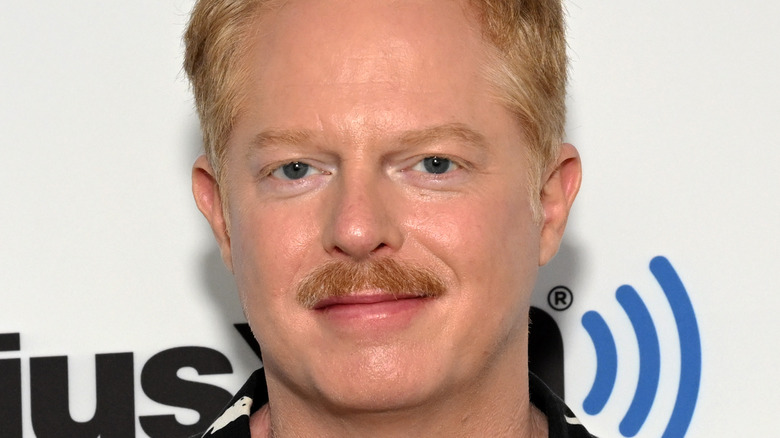 Jesse Tyler Ferguson posing at event