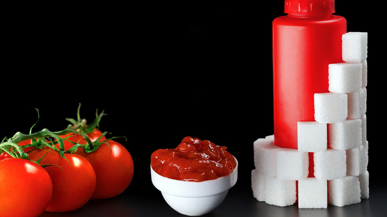 Sugar cubes stacked around ketchup bottle