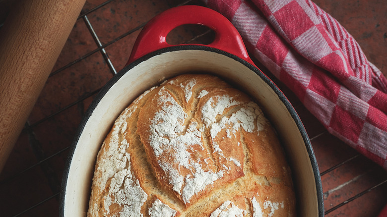 A loaf of bread baked in a Le Creuset dish