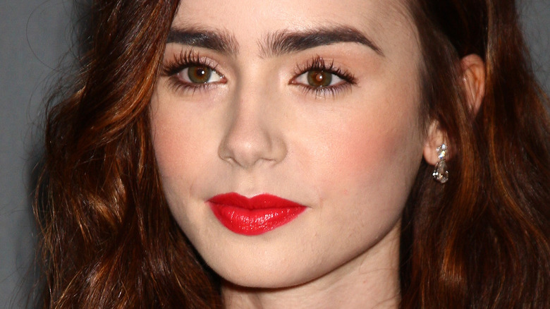 Lily Collins red lipstick