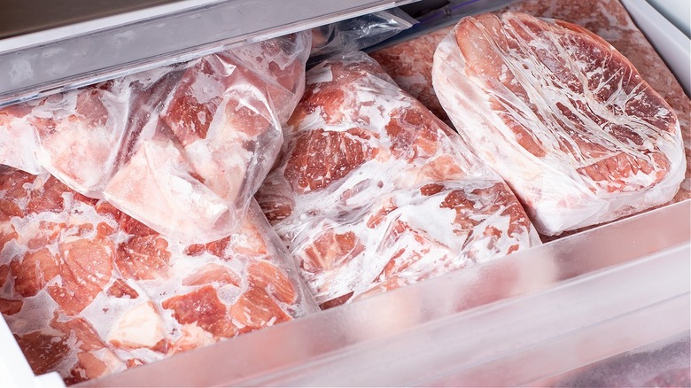 Frozen red meat in freezer drawer