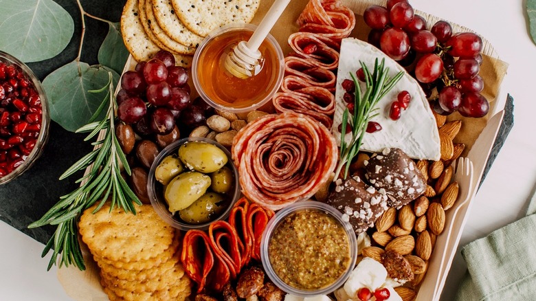 Charcuterie board with meats and cheeses