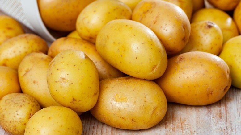 Cooked potatoes on a wooden countertop