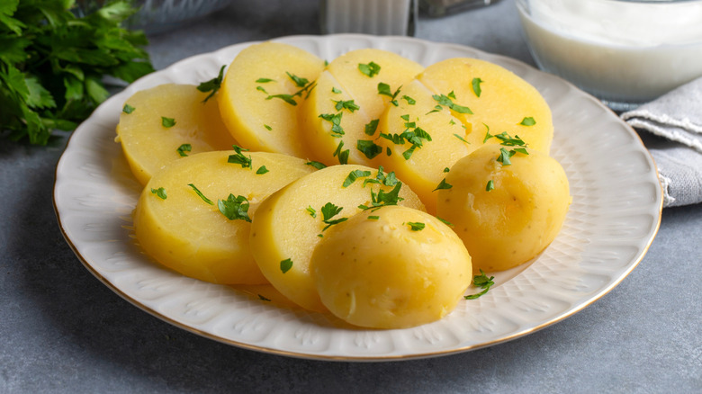 Cooked potato slices on a plate