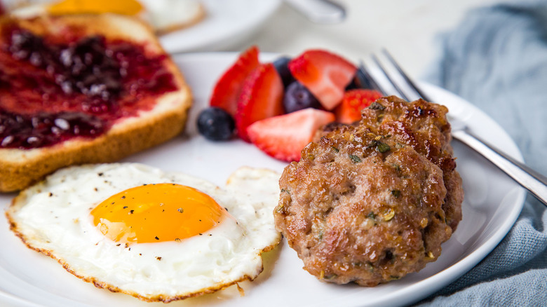 sausage egg fruit and toast