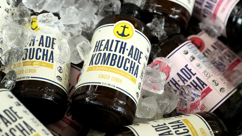 Healthade kombucha bottles on ice