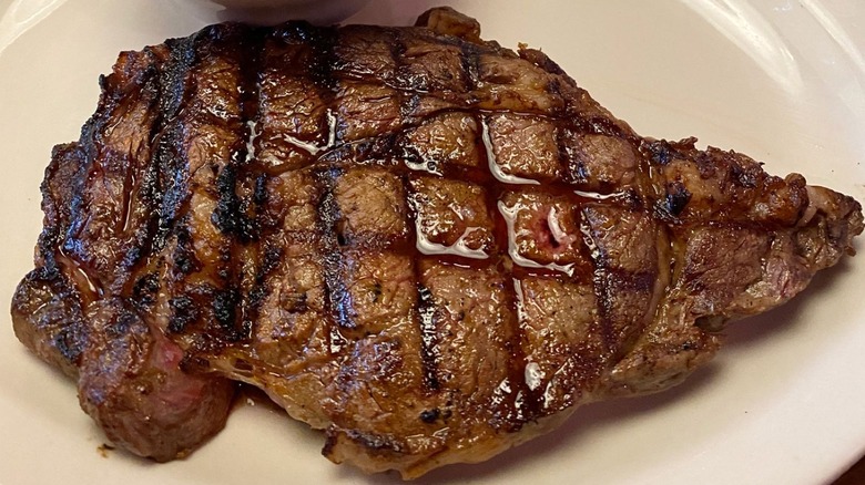 Texas Roadhouse steak on white plate