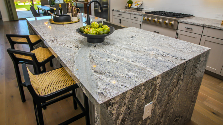 Gray-and-brown granite countertop in kitchen
