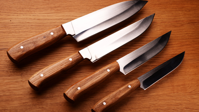 Japanese kitchen knives on wood