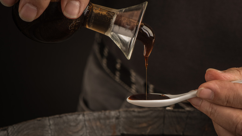 Pouring balsamic vinegar