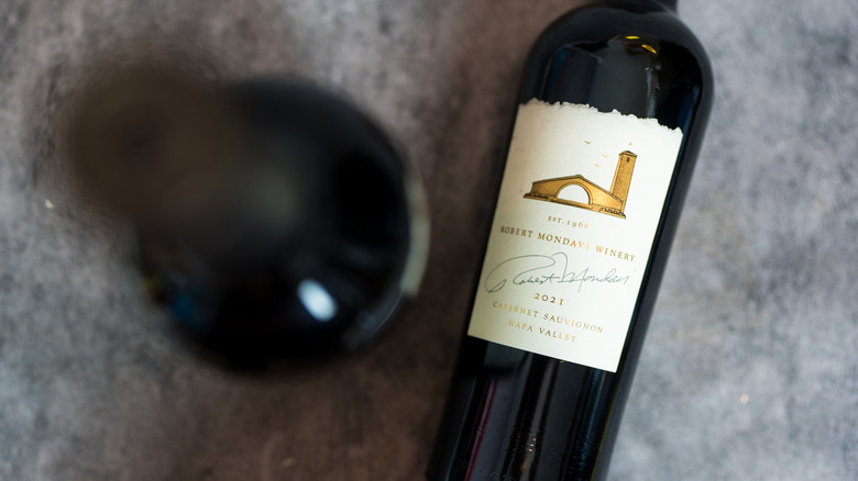 Cabernet sauvignon bottles on gray background