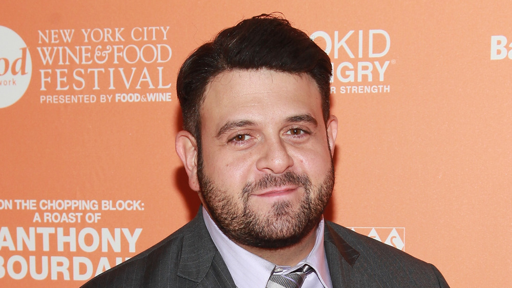 Adam Richman in a suit at New York City Wine & Food Festival