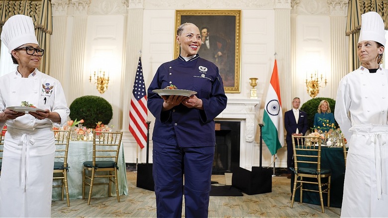 White House chefs serving plate