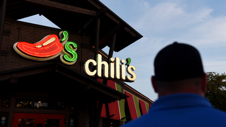 Man outside Chili's restaurant