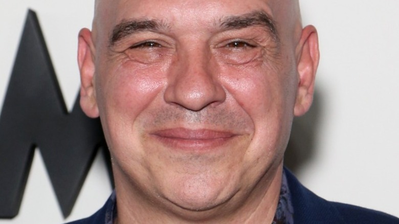 Michael Symon with slight smirk