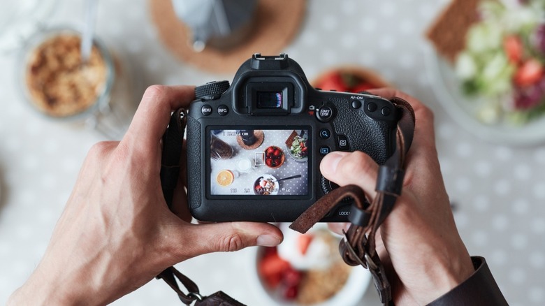 Food stylist photographing food