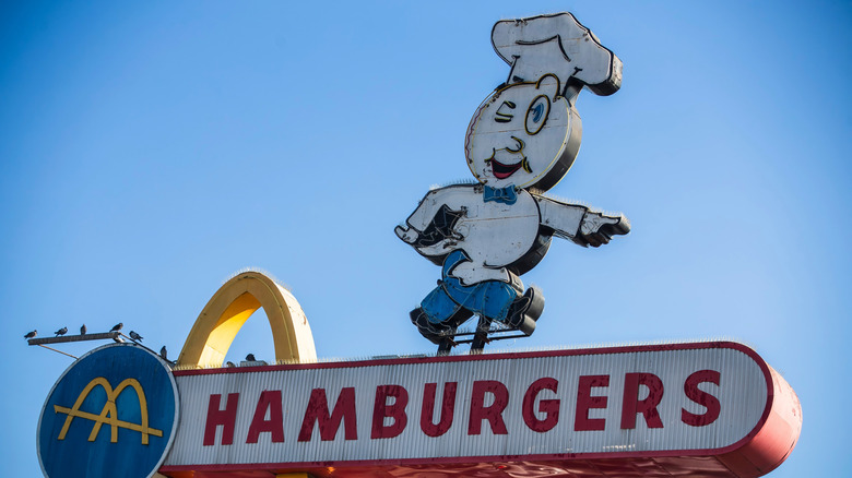 Vintage McDonald's neon "Hamburgers" sign with Speedee mascot.