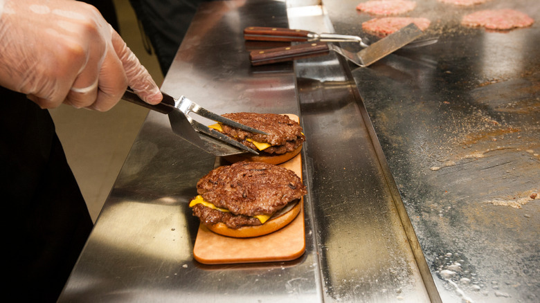 cheese burgers on the grill at Steak 'n Shake