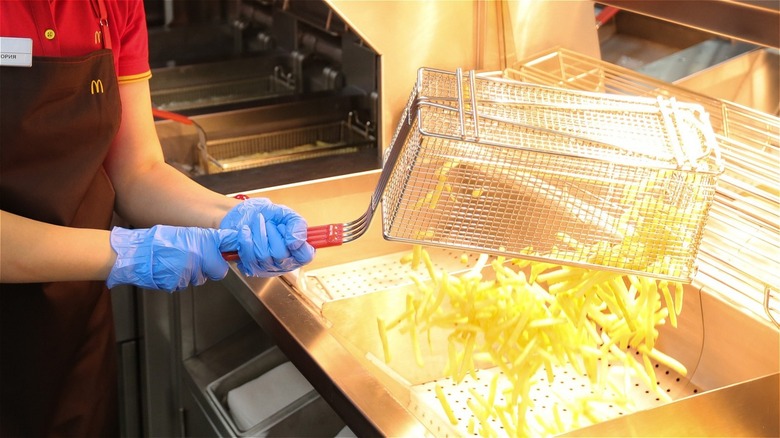 McDonald's fry cook making fries