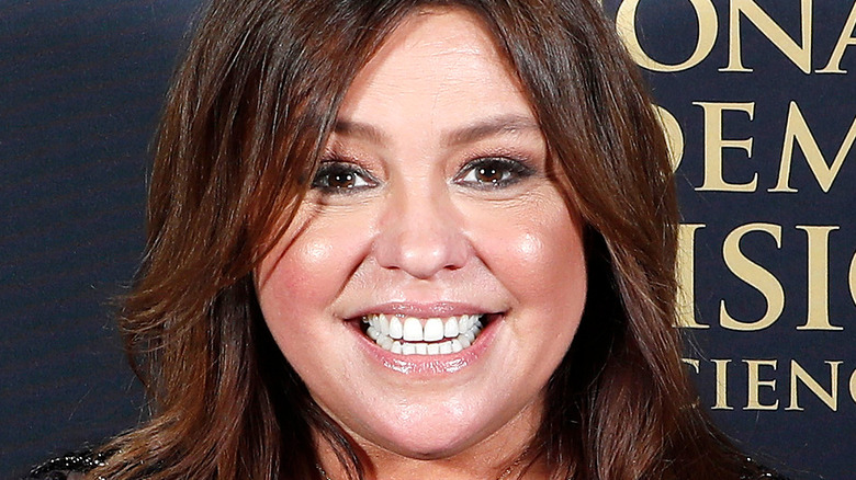 Rachael Ray smiles with brown eyeshadow and lipgloss