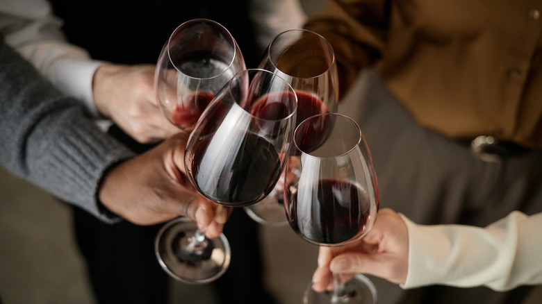 A group toasting glasses of wine.