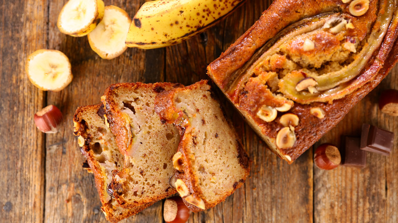 Banana bread slices on a wooden board
