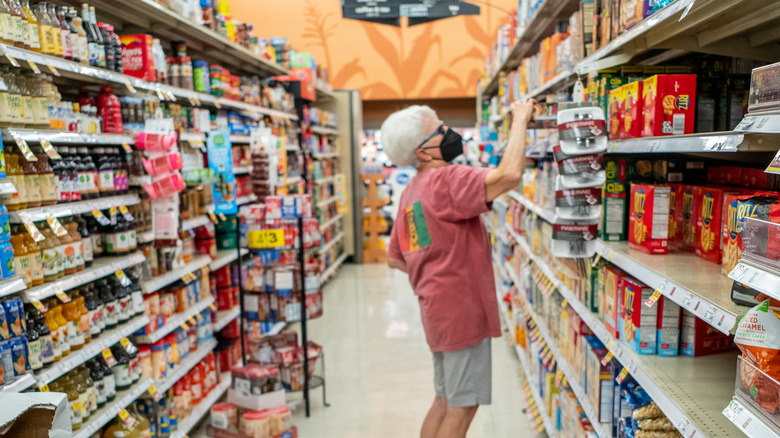 Shopper looking at items