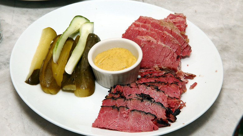 pastrami platter with mustard and pickles