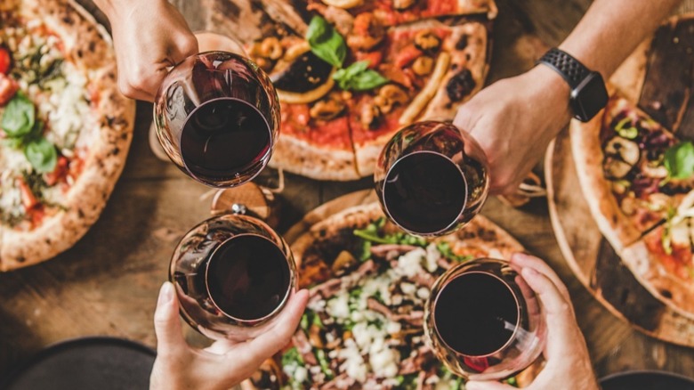 Group enjoys different pizza styles and drinks