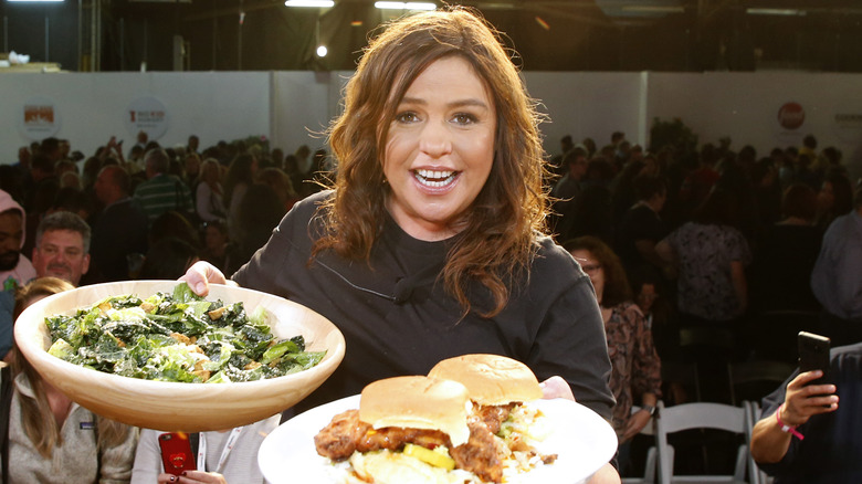 Rachael Ray holds plated food