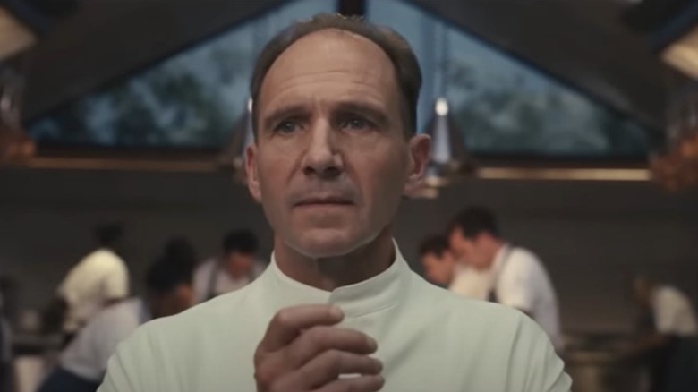 Ralph Fiennes clapping in The Menu