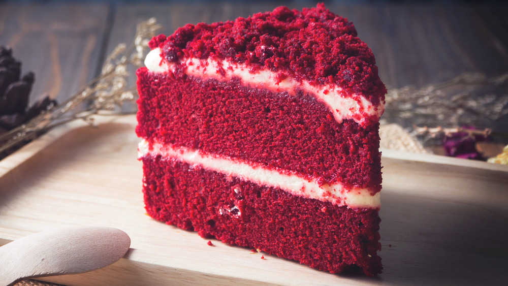 a slice of red velvet cake on a plate