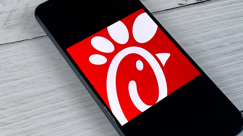 Chick-fil-A logo on mobile device screen